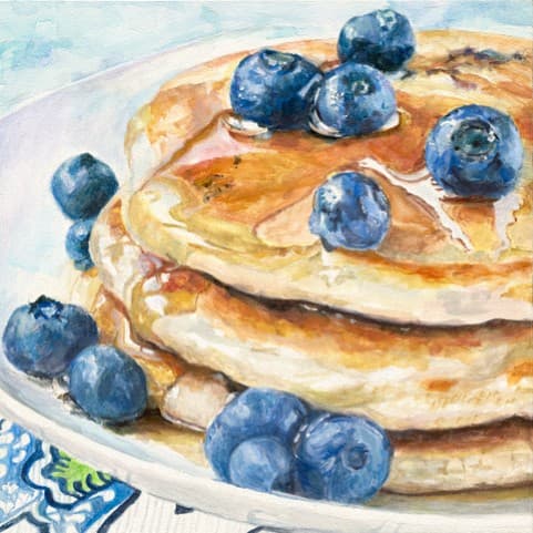 A painting of a stack of pancakes